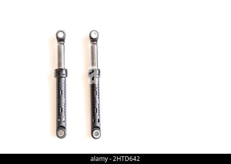 Washing machine shock absorber isolated on white background in clipping path. Stock Photo