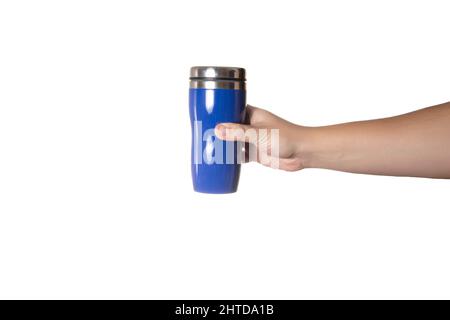 Blue thermo mug with tea in a man's hand on a white background, isolate. Close-up Stock Photo