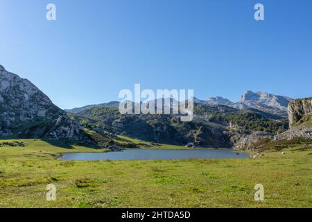 Closeup of the glacial Lake Ercina nestled among marvelous mountain tops in Spain Stock Photo