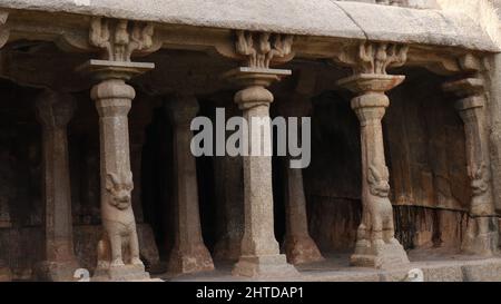 a close up shot of Krishna Mandapam columns at Arjuna's Penance Mahabalipuram Stock Photo