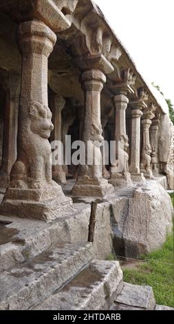 Vertical shot of Krishna Mandapam columns at Arjuna's Penance Mahabalipuram Stock Photo