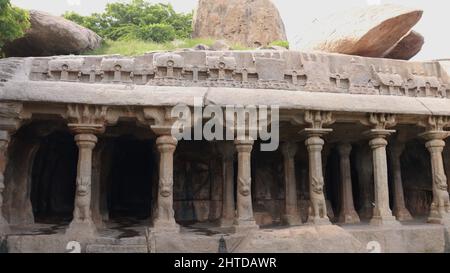 a close up shot of Krishna Mandapam columns at Arjuna's Penance Mahabalipuram Stock Photo