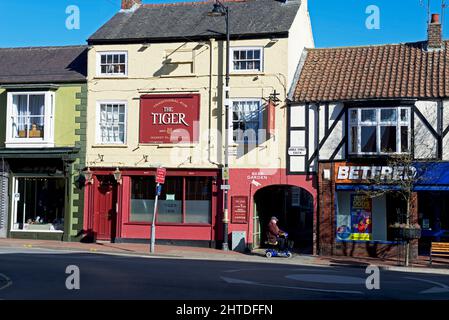 Man on mobility scooter in Driffield, East Yorkshire, England UK Stock Photo