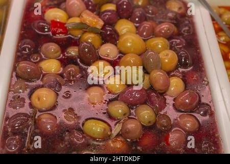 Olives in brine in salt water. Stock Photo