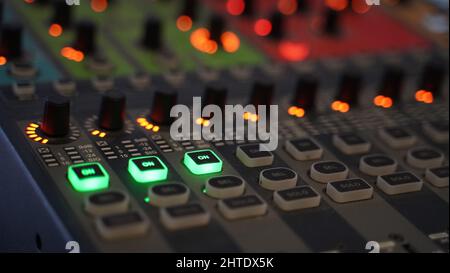 Colored Keys and Green On Keys of Volume Mixer Device Stock Photo