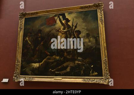 The Liberty leading the people painting by Eugene Delacroix in the Louvre Museum, Paris, France Stock Photo