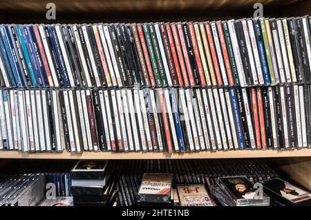 CDs, CD music, albums on shelf in charity shop Stock Photo