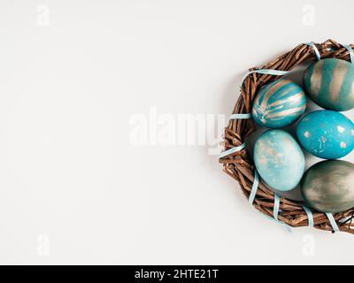 Happy Easter. Easter eggs painted with colorful paints. Closeup, indoors, no people, view from above Congratulations for loved ones, relatives, friend Stock Photo