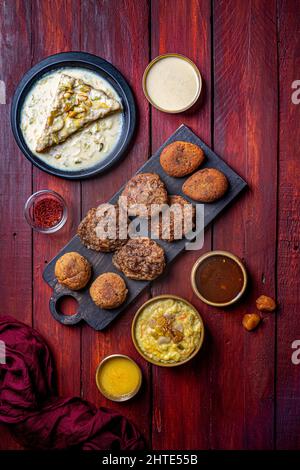 Vertical shot of Tunde ke kabab Indian dish with sauces Stock Photo