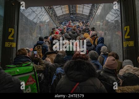 27th February 2022. Lviv Train Station, Ukraine. Thousands flock to Lviv station to try to get a train out of Ukraine as desperation grows at Ukraine border as more than half a million refugees flee war - Copyright: Bel Trew/The Credit: Independent/Alamy Live News Stock Photo