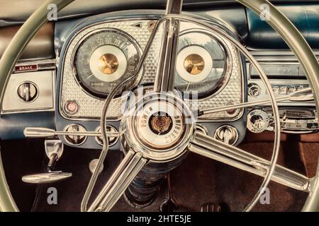 Drempt, The Netherlands - July 7, 2021: Dashboard of a vintage Chrysler classic car  in the Dutch village of Drempt, The Netherlands Stock Photo