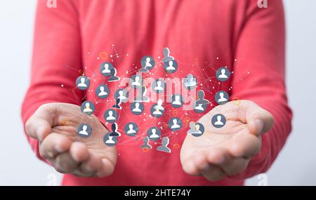 A male hand silhouette showing a digital organization network Stock Photo