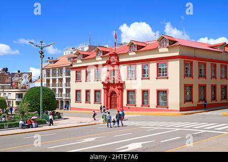 Street Scene of Plaza de Armas Square with the Amazing Justice Palace in the City of Puno, Peru, South America Stock Photo
