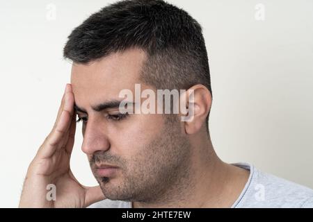 Overthinking man who has anxiety. Stock Photo