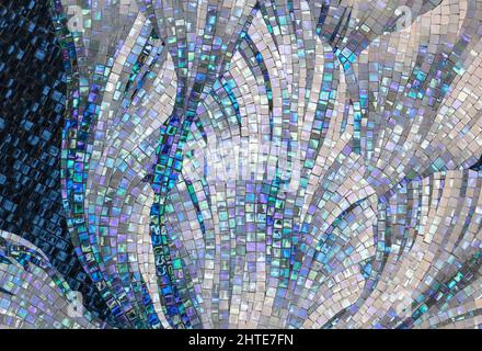 Mother-of-pearl ceramic tile mosaic laid out in the form of flower petals. Stock Photo