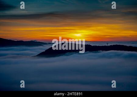 Sea of fog over the Tenes Valley at sunrise, Sant Feliu de Codines, Catalonia, Spain. Stock Photo