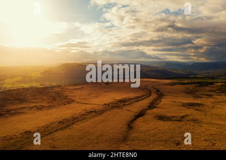 Golden sunset over fields after a heavy storm in the Peak District Stock Photo