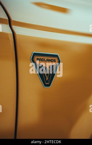 Closeup shot of a sign on a yellow Ford Bronco Badlands SUV Stock Photo