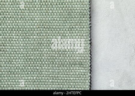 Masterly fabric background in new olive colour. Seamless square texture, tile ready. Stock Photo