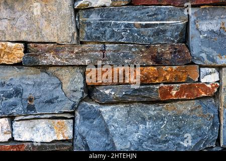 Walls made of multicolor stones , Stone background. Ancient stone wall. Grunge stone wall backdrop. Background of old vintage stone wall. Wall decorat Stock Photo