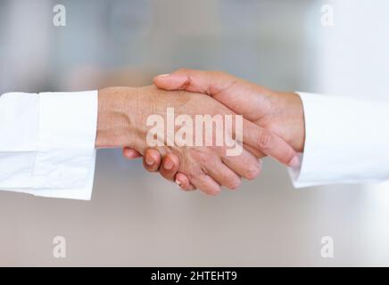 Deal. Closeup of handshake between business men. Stock Photo