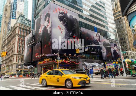 Advertising for the Warner Bros. PicturesÕ  ÒThe BatmanÓ film is seen in Times Square in New York on Wednesday, February 16, 2022. The film, starring Robert Pattinson, is scheduled to be released in the U.S. on March 4, 2022. (© Richard B. Levine) Stock Photo