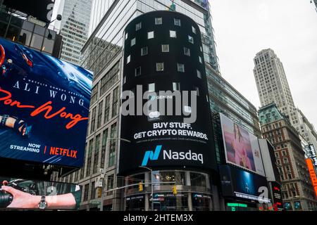 The Nasdaq stock exchange advertises the Gemini Credit Card on Wednesday, February 16, 2022. The card offers cash back rewards in a variety of cryptocurrencies. The card is affiliated with the Cameron and Tyler Winklevoss' Gemini Cryptocurrency Exchange founded in 2015 trading Bitcoin and other cryptocurrencies. (© Richard B. Levine) Stock Photo