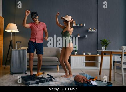 Couple having fun before going on resort Stock Photo
