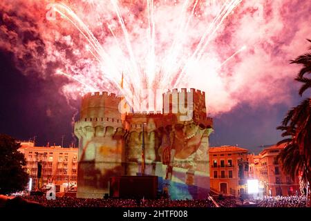 Valencia, Spain. 27th Feb, 2022. View of the Serrano Towers during La Crida de las Fallas 2022 in Valencia. La Crida, the proclamation in Spanish, is celebrated on the last Sunday of February and is the official act in which the Fallera Mayor of the city gathers all the Fallas commissions at the gates of the Serrano Towers and performs a call, to the initiation of the festivities, to all Valencians and all visitors. In this act, the mayor of Valencia hands over the keys of the city to the Fallera Mayor and the fallas are considered to have begun. Credit: SOPA Images Limited/Alamy Live News Stock Photo