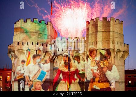 Valencia, Spain. 27th Feb, 2022. View of the Serrano Towers during La Crida de las Fallas 2022 in Valencia. La Crida, the proclamation in Spanish, is celebrated on the last Sunday of February and is the official act in which the Fallera Mayor of the city gathers all the Fallas commissions at the gates of the Serrano Towers and performs a call, to the initiation of the festivities, to all Valencians and all visitors. In this act, the mayor of Valencia hands over the keys of the city to the Fallera Mayor and the fallas are considered to have begun. Credit: SOPA Images Limited/Alamy Live News Stock Photo