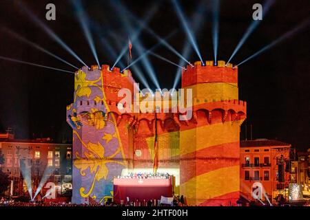 Valencia, Spain. 27th Feb, 2022. View of the Serrano Towers during La Crida de las Fallas 2022 in Valencia. La Crida, the proclamation in Spanish, is celebrated on the last Sunday of February and is the official act in which the Fallera Mayor of the city gathers all the Fallas commissions at the gates of the Serrano Towers and performs a call, to the initiation of the festivities, to all Valencians and all visitors. In this act, the mayor of Valencia hands over the keys of the city to the Fallera Mayor and the fallas are considered to have begun. Credit: SOPA Images Limited/Alamy Live News Stock Photo