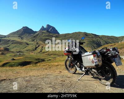 Adventure motorcycle parked in front of Col du Pourtalet, Pyrenees Stock Photo