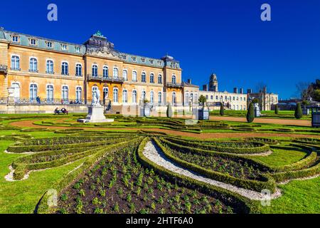 Exterior of early 18th century country mansion Wrest House and topiary of the French Parterre Garden, Wrest Park, Bedfordshire, UK Stock Photo