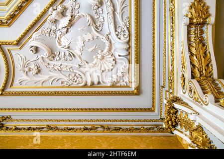 Ornate white and gold plaster ceiling at the French-style rococo revival Dining Room in Wrest House, Wrest Park, Bedfordshire, UK Stock Photo