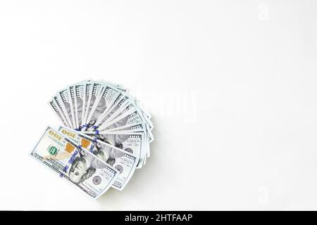 Scrolled stack of dollar bills. American dollar is the official currency of the United States of America Stock Photo