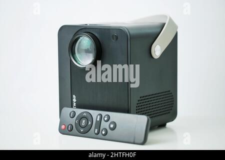 Photo of Blitzwolf portable projector with remote control isolated on a white background Stock Photo