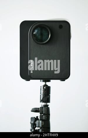 Photo of Blitzwolf portable projector with remote control isolated on a white background Stock Photo