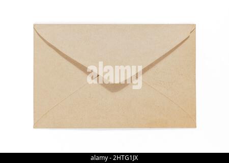 Old yellow aged envelope with copy space on it. Isolated on white, clipping path included Stock Photo