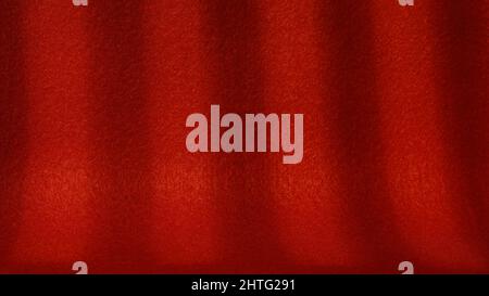 Dark red felt covered scene with deep shadows. Texture and background with copy space Stock Photo
