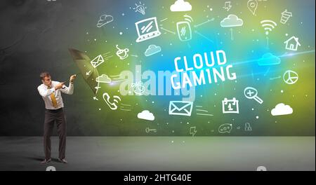 Businessman defending with umbrella, modern technology concept Stock Photo