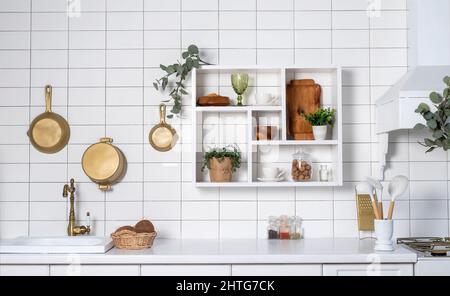 Modern stylish Scandinavian kitchen interior with kitchen accessories.  Bright white kitchen with household items Stock Photo - Alamy