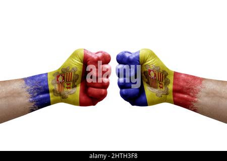 Two hands punch to each others on white background. Country flags painted fists, conflict crisis concept between andorra and andorra Stock Photo
