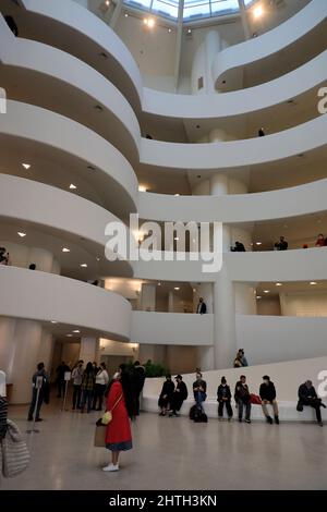 Interior view of circular ramps in Solomon R. Guggenheim Museum with visitors.New York City.New York.USA Stock Photo