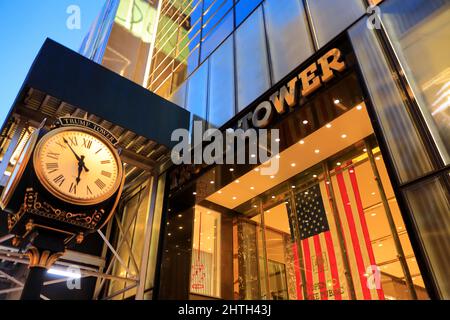 Entrance of Trump Tower on 725 5th Avenue with Trump Tower clock at dusk.Midtown Manhattan.New York City.New York.USA Stock Photo
