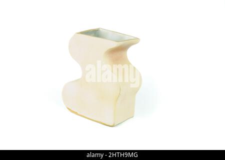 Empty ceramic vase, isolated on white background, side view. Stock Photo