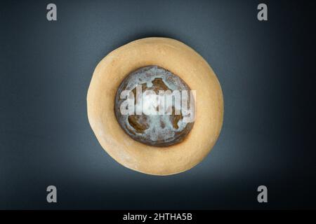 Empty vintage ceramics bowl, dish or crock pot, isolated on black background, top view. Stock Photo