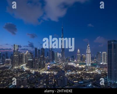 Aerial view of the skyline in Dubai Downtown after sunset during the blue hour. Dubai, United Arab Emirates. Stock Photo