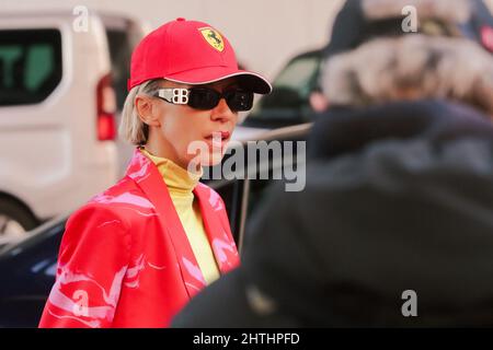 Guest at Ferrari fashion show during the Milan Fashion Week Fall/Winter 2022/2023 on February 27, 2022 in Milan, Italy. Stock Photo
