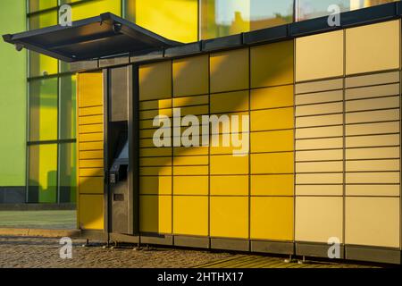 post terminal machine on the background of a modern building Stock Photo