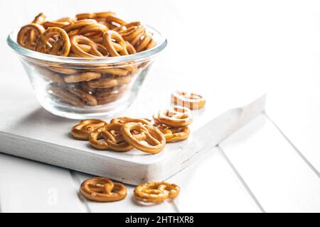 Mini pretzels. Crusty salted snack in a bowl. Stock Photo